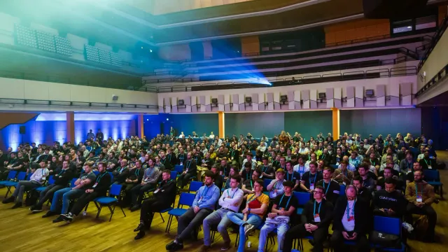 Full auditorium audience at an engineering leadership conference where Marian Kamenistak spoke.