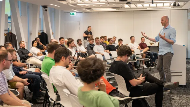 Marian Kamenistak speaking to a full room of engineering leaders at an ELC meetup.
